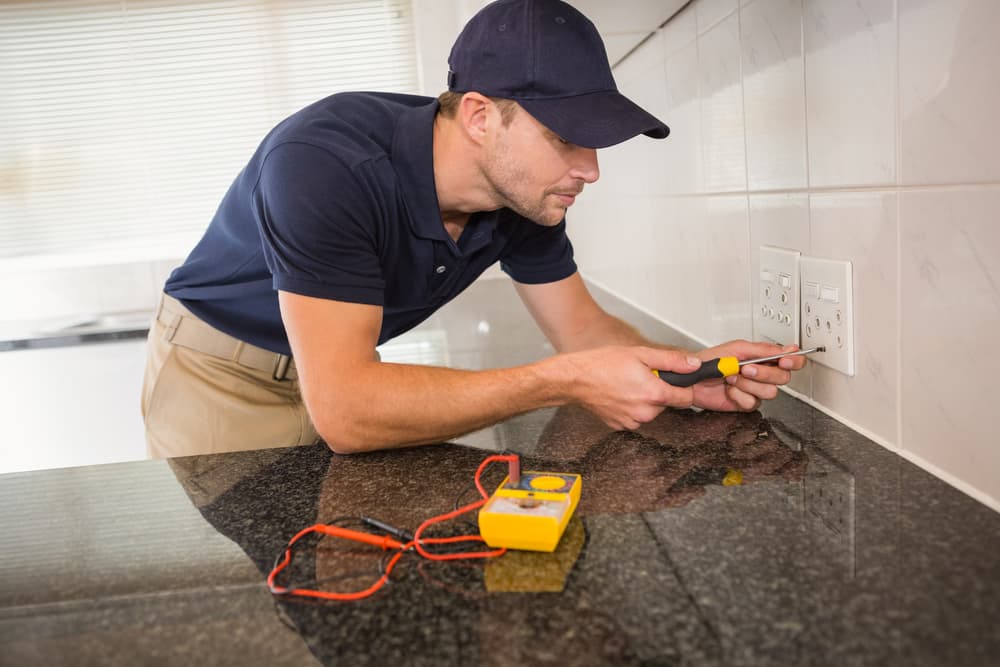 Castle Hill Electrician installing new power outlet - Castle Hill