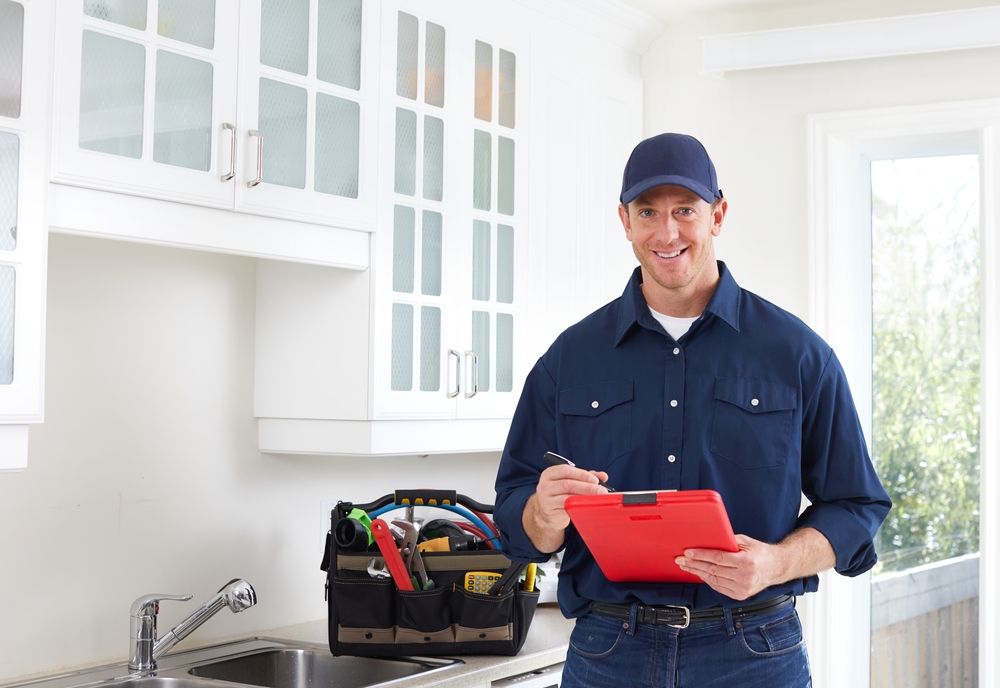 plumber-standing-next-to-sink