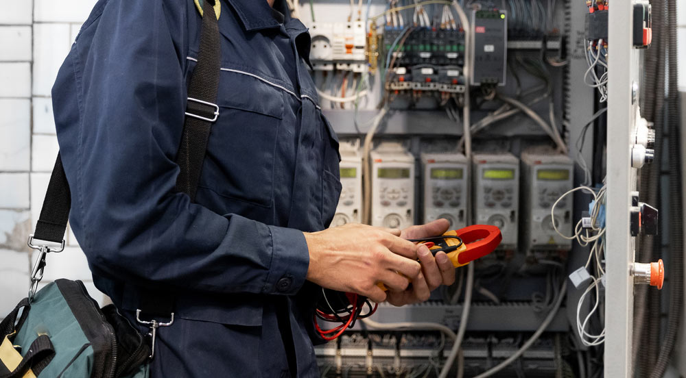 Electrician Engineer Checks Electrical Circuit