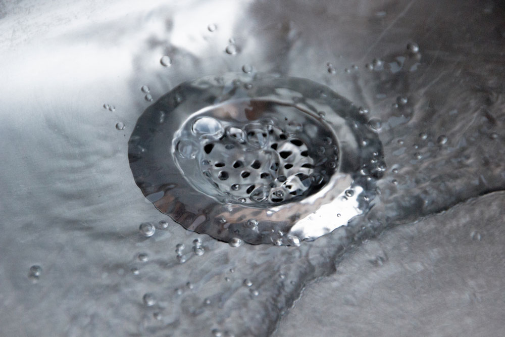 Kitchen Sink With Water — O'Brien Plumbing Wyong in Wyong, NSW