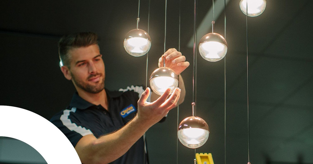 A Professional Electrician At Work