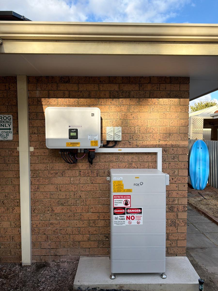 solar battery installed outside a brick house in australia